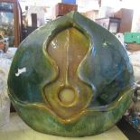 An Art pottery sculpture, with organic decoration, height 13.5ins