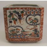 A 19th century Imari jardiniere, decorated with four panels of pagodas and flowers, having chamfered