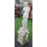 A garden statue of Venus de Milo, raised on a square plinth base, height 54ins