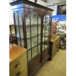 An Edwardian mahogany display cabinet, in the Georgian style, raised on short cabriole legs