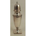 A silver sugar caster, with a band of decoration, raised on a pedestal to a square foot,