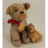 A Steiff dog, Mopsy, together with a plush toy boxer dog, possibly Steiff
