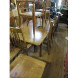 An oak extending dining table, 78ins x 42ins