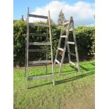A large pair of tapering, A-frame, four tread, painter's trestles, height 88ins