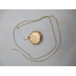 A 9 carat gold locket and chain, 5.4g gross
