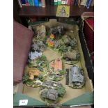 A box of Danbury Mint model cottages