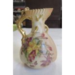 A Royal Worcester blush ivory jug, decorated with flowers, having gilded coral handle, shape