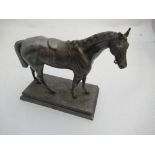A metal study of a saddled horse, stamped Dietrich, height 9ins