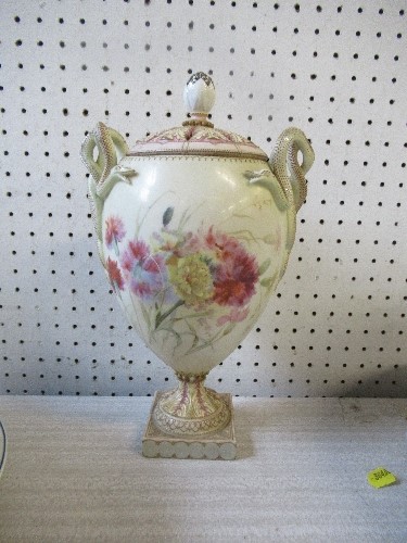 A Royal Worcester style covered vase, unmarked, painted with summer flowers, height 12ins