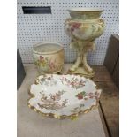 A Royal Worcester blush ivory vase, decorated with flowers and rams' heads and hoof feet, together