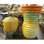 A Clarice Cliff My Garden biscuit barrel, together with a Clarice Cliff ribbed vase