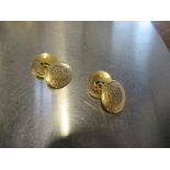 A pair of 15ct gold cuff links, weight 9g