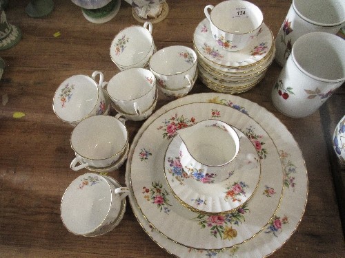 A Royal Worcester Roanoke part tea set, comprising 12 cups, 12 saucers, a jug, a sugar bowl, 2 large