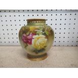 A Royal Worcester circular squat vase, having pierced neck, painted with roses, shape number H278,