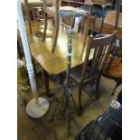 A torchere stand, raised on four supports height 49.5ins