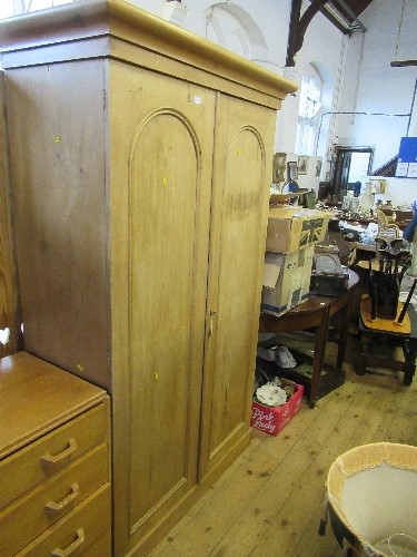 A late 19th century pine wardrobe, width 43ins, Max width at top cornice is 47ins, depth 21.5ins and