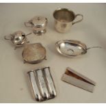 A collection of hallmarked silver, to include a ring box with hammered finish, a comb case, part