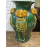 A pair of early 19th century lobed ovoid vase, decorated with dragons in yellow, to a green