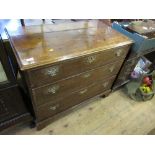 A Georgian oak chest of three long drawers, raised on bracket feet, width 39ins