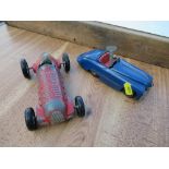 A Tri-Ang Minic Toys clockwork car, together with a Mettoy Castoys racing car R40