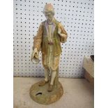 A Royal Worcester figure, Middle Eastern water carrier, height 12.5ins