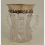 A Tiffany And Company New York silver mounted cut glass three handled loving cup, of waisted form,