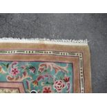 A large cream ground rug