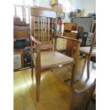 A set of seven (6+1) Art Nouveau style oak dining chairs