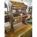 A pine plate rack inset with a penny, width 19.5ins