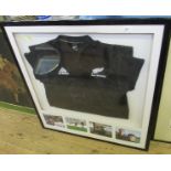 A framed signed All Blacks shirt