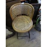 A rattan style high stool chair, height to seat 24ins