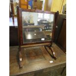 A late 19th century mahogany rectangular swing frame toilet mirror width 18ins