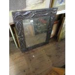 An arts and crafts style mirror