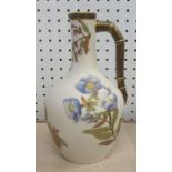 A Royal Worcester blush ivory jug, decorated with flowers, with bamboo handle, height 8ins