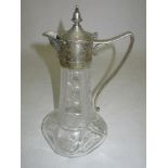 A silver plate and glass claret jug, with masked spout and star cut and hobnail decoration to the