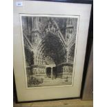 A signed etching of a cathedral