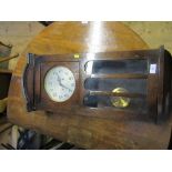 An Enfield oak cased wall clock, height 31ins