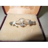 A Birmingham white metal sailor's sweet heart brooch, with a cross, anchor and heart decoration,