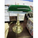 A desk lamp, with green shade