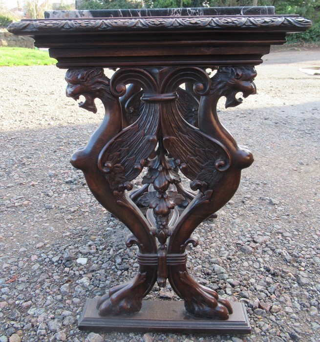 A marble topped mahogany table, the rectangular marble set in to a carved frame, raised on end - Image 2 of 3