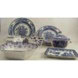 Two 19th century blue and white plates, decorated with flowers, together with a rectangular dish,