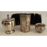 A group of hallmarked silver, to include a covered pot, af, a salt cellar, a sleeve and a Scottish