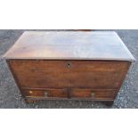 An Antique oak mule chest, with rising lid and fitted with two drawers, 37.5ins x 20ins, height
