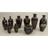 A group of cloisonne vases, to include three pairs, one pair with octagonal body decorated with