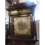 An Antique mahogany cased long case clock, the square brass dial with silvered chapter ring an two