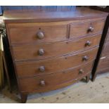 A mahogany bow front chest, of two short over three long drawers, width 41ins, depth 20ins, height