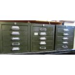 Three sets of metal filing drawers