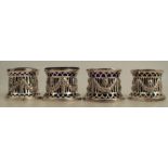A set of four silver open salts, with pierced Classical decoration, London 1909, weight 3oz