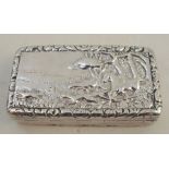 A Georgian silver snuff box, of rectangular form, the hinged cover embossed with a hunting scene,