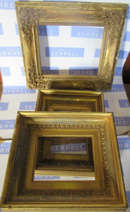 A pair of 19th century gilt picture frames, together with a moulded gilt frame with label verso